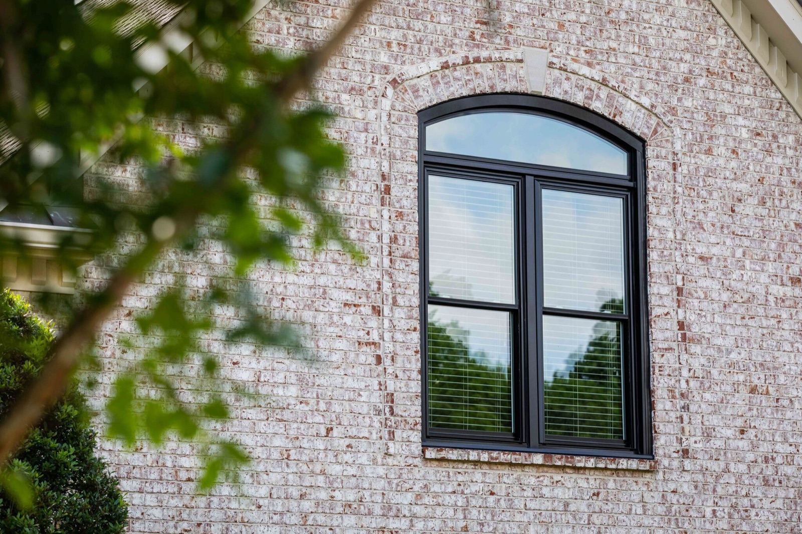 Pella Symphony double-hung architectural window on a home exterior